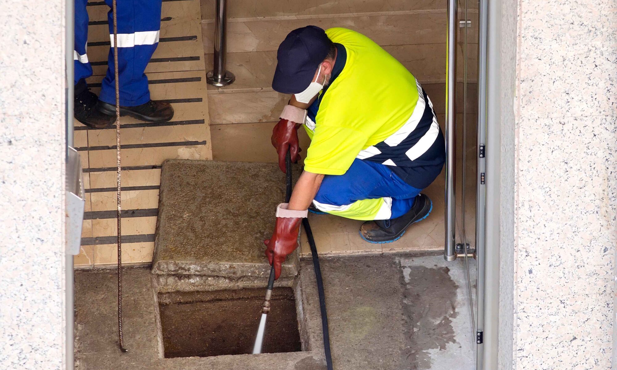 man doing a metro denver drain cleaning