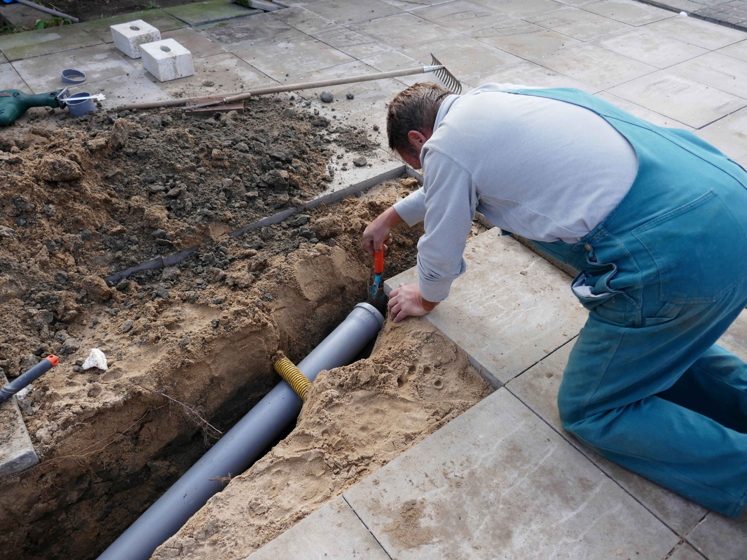 man inspecting sewer lines