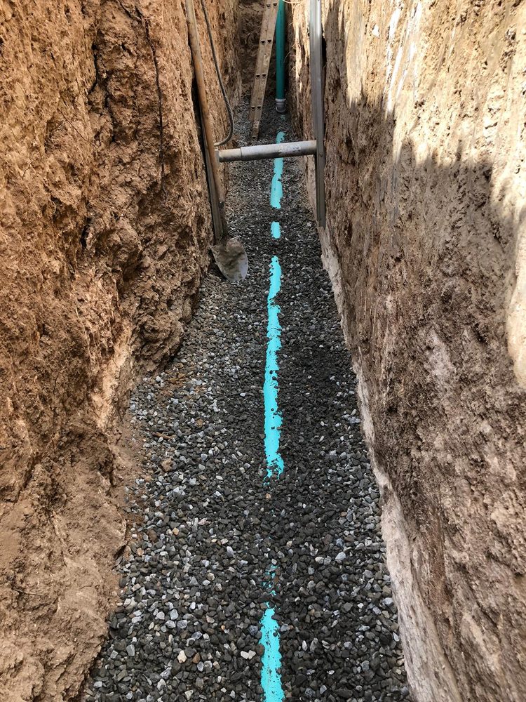 new water line on bedding in a Denver trench